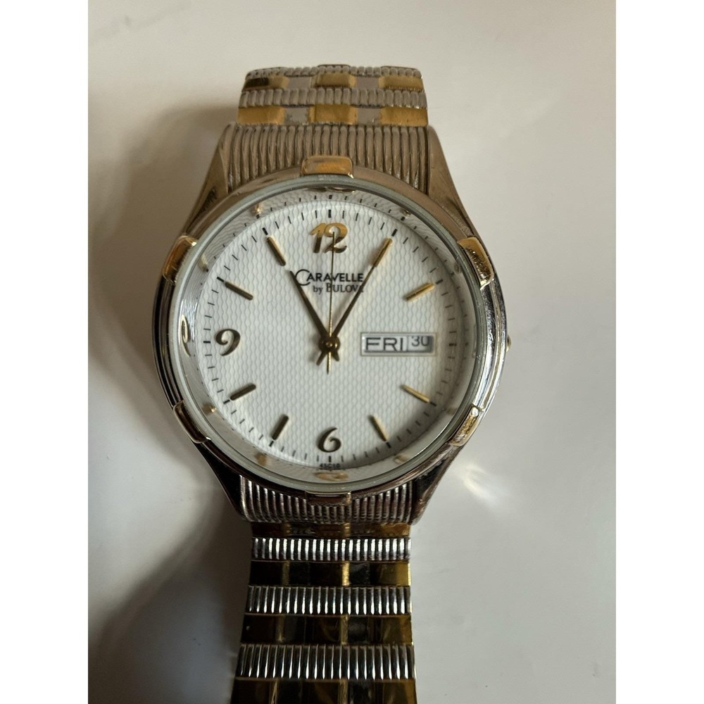 Caravelle by Bulova quartz watch — excellent condition, two-tone finish.